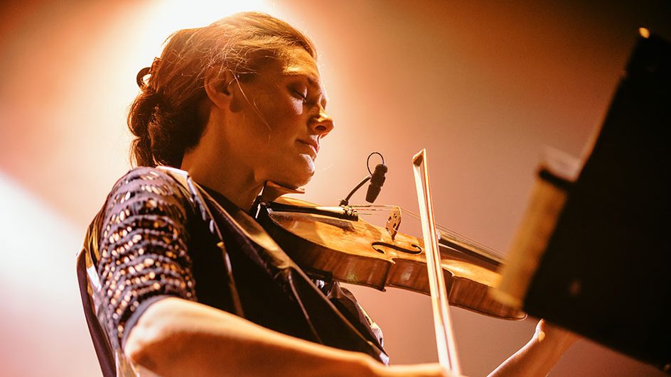 Raki Singh playing the violin
