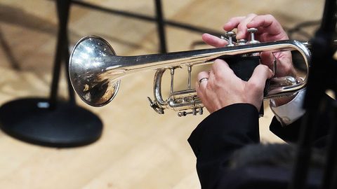hands on a trumpet