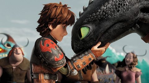 A boy with a dragon, eye to eye