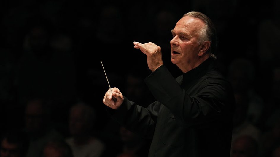 Sir Mark Elder conducting