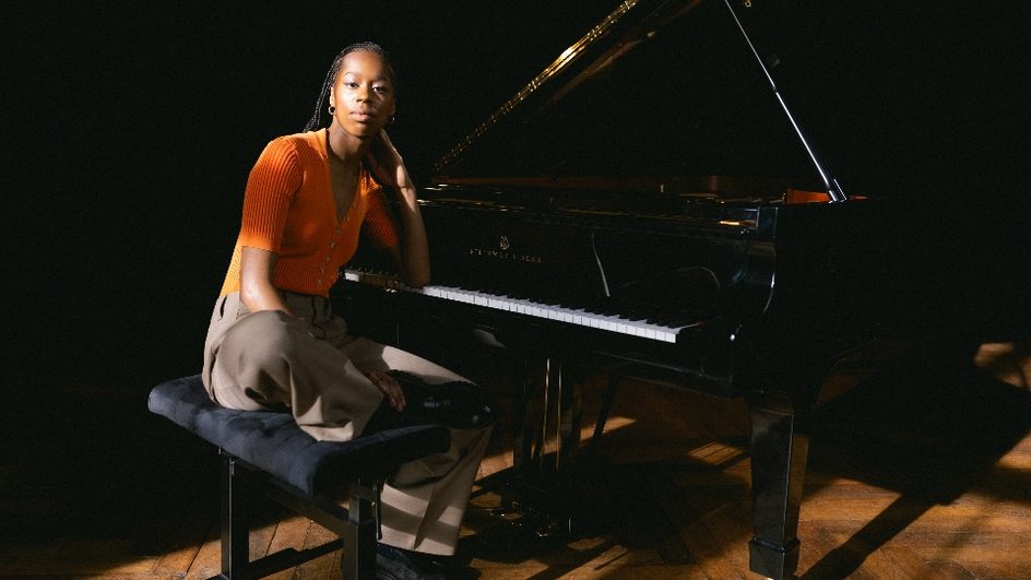 Jeneba Kanneh-Mason by the piano