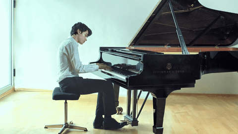 Tom Borrow at the piano